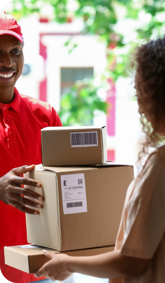 Delivery person handing packages to customer